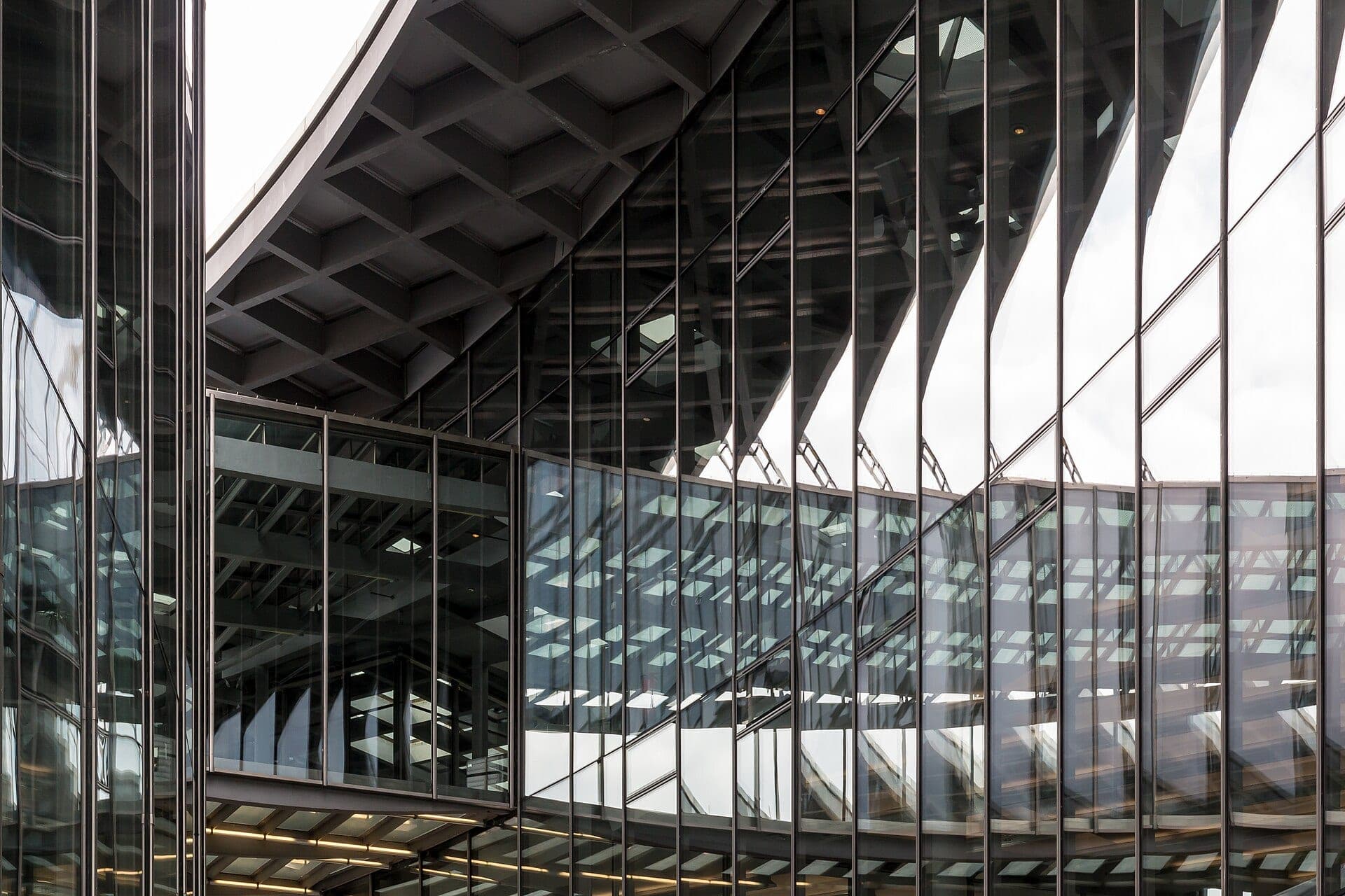 Glass facade of a modern commercial office building